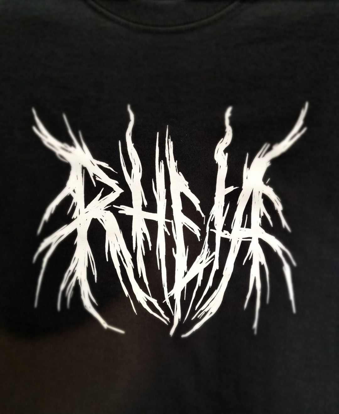 Мерч Rheia